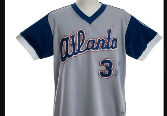 Atlanta Braves Jerseys 1 1970s Atlanta Braves gray pullover jersey with blue sleeves and script ‘Atlanta’ across the chest outlined in red and blue