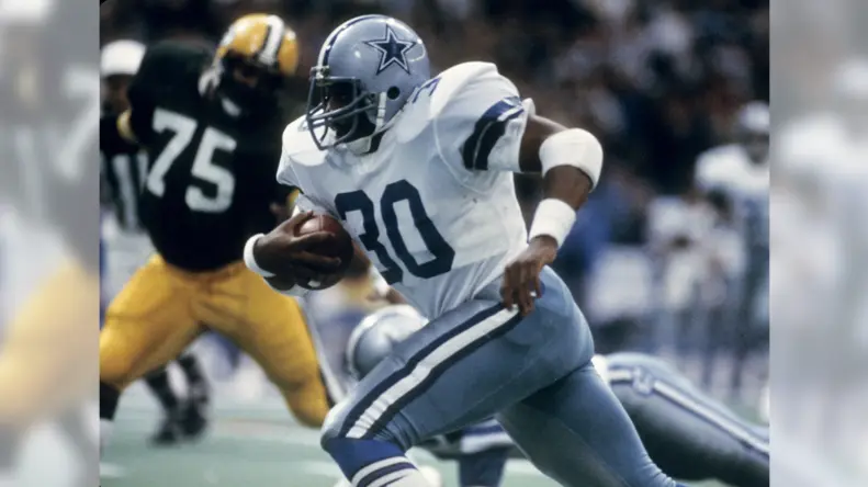Dallas Cowboys Jerseys 9 Dallas Cowboys player in the 1970s wearing the classic white home uniform with silver-blue pants and the iconic star helmet during the team’s Super Bowl era.