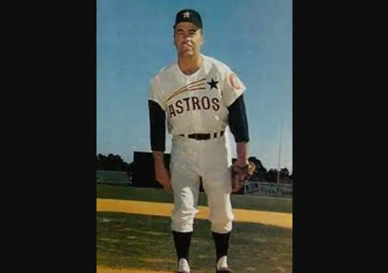 Houston Astros Jerseys 9 Houston Astros player wearing white pullover uniform with ‘Astros’ script and front chest number, representing the 1971–1974 era of bold-numbered jersey design
