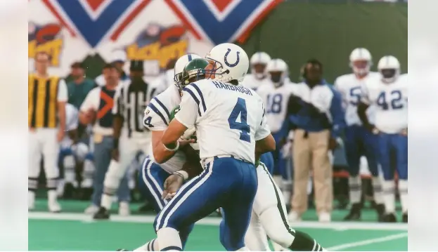 Indianapolis Colts player wearing number 4 in white jersey and blue pants during the 2004–2019 Manning Dynasty era