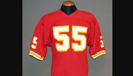 1970s–1980s Kansas City Chiefs red and gold uniform with white facemask, classic Arrowhead era