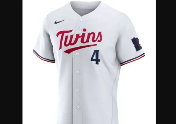 Modern Minnesota Twins white jersey with red script ‘Twins’ outlined in navy and gold trim accents