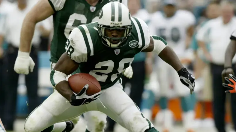 New York Jets player wearing number 28 in the 1998–2018 Kelly Green and white uniform during a game