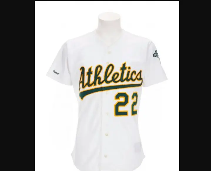 Oakland Athletics white button-down jersey with green and gold script ‘Athletics’ and number 22, representing the 1982–1992 era of classic buttoned uniforms