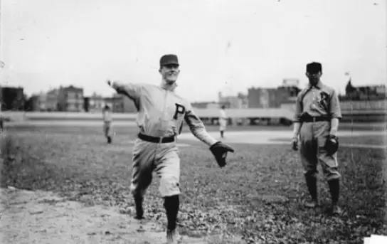 Vintage photo of early Philadelphia Phillies players wearing flannel uniforms with a large block ‘P’ on the chest during a game in the early 1900s