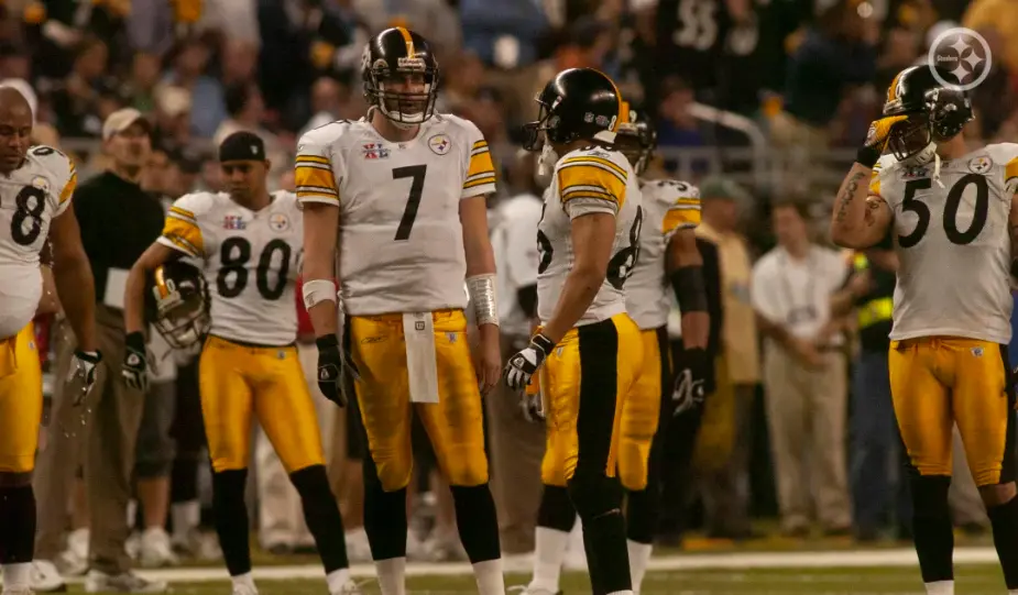 Pittsburgh Steelers players wearing white and gold uniforms during the 2012–present Color Rush and throwback era