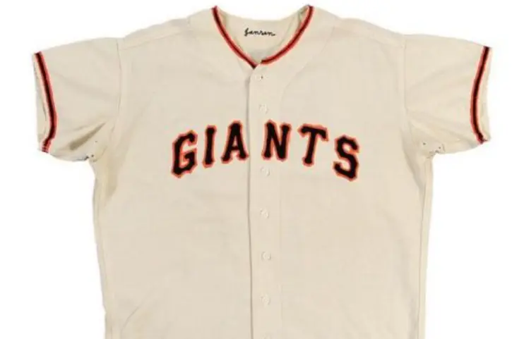 1958–1971 San Francisco Giants cream-colored jersey with black ‘GIANTS’ lettering outlined in orange, representing the team’s early San Francisco era